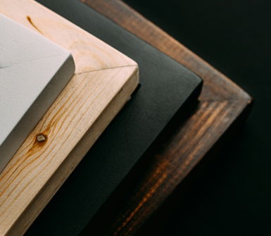white book on black textile